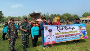 Sinergi dengan Pemerintah Desa, Babinsa Koramil 429-15/PS Hadiri Hari Jadi ke-38 Desa Rejomulyo