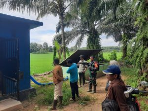 Babinsa Koramil 03/MT Dampingi Penyerahan Alsintan Combine Brigade Pangan Desa Gedung Wani