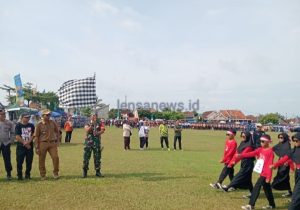Wakili Danramil 429-14/Jabung, Serda Slamet Hadiri Lomba Gerak Jalan dalam Rangka HUT RI ke – 80