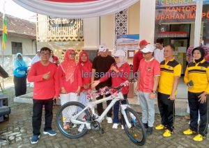 Ketua DPRD Kota Metro Ria Hartini hadiri Gelaran HUT RI ke-80 Tahun 2025 di Kelurahan Imopuro