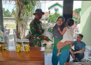 Koramil 429-06/Purbolinggo Hadir Monitoring Pendistribusian Bansos Beras dan Minyak Goreng